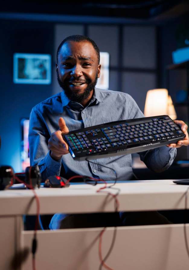 IT professional holding a keyboard